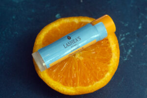 Lip Balm Product on Orange Slice